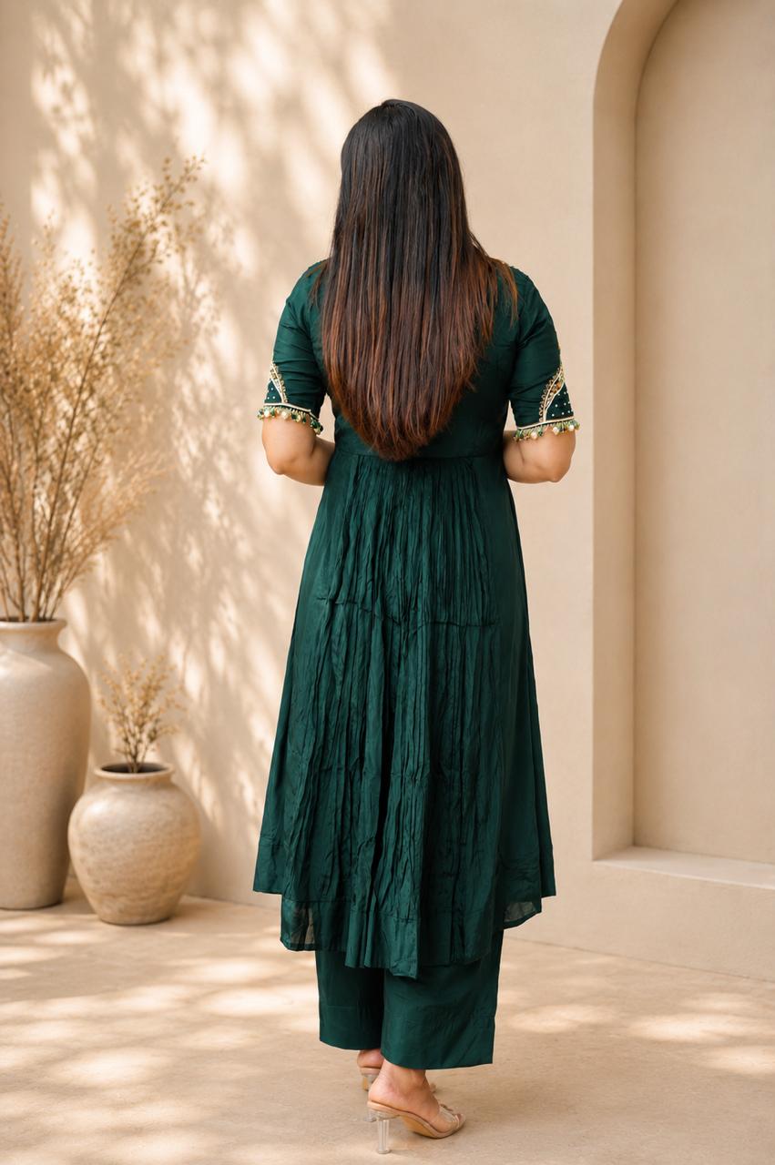 Back view of emerald green Anarkali kurta set with matching pants
