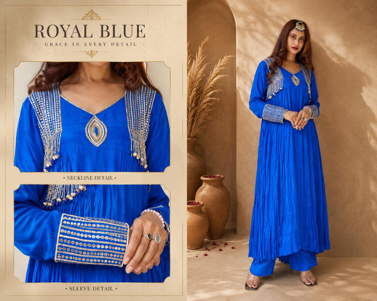 Royal blue Anarkali suit with embroidered neckline and sleeve detailing