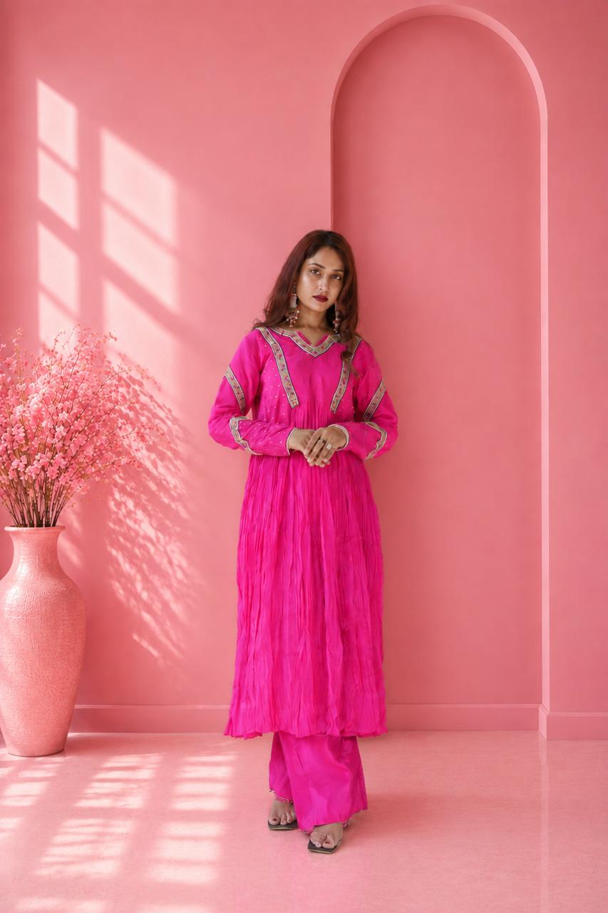 Bright pink embroidered Anarkali suit with palazzo showing full front silhouette