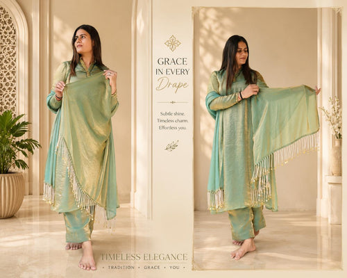 Sage green kurta pant set with matching dupatta and tassel detailing