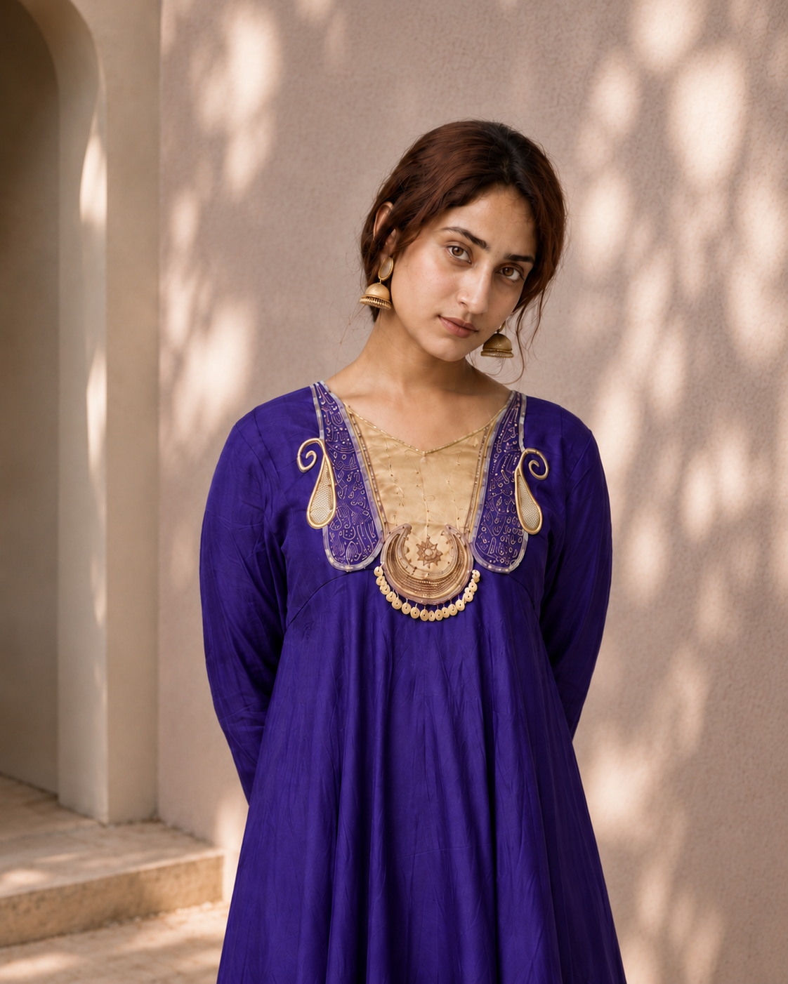 Royal purple Anarkali kurta with gold embroidered neckline and matching pants