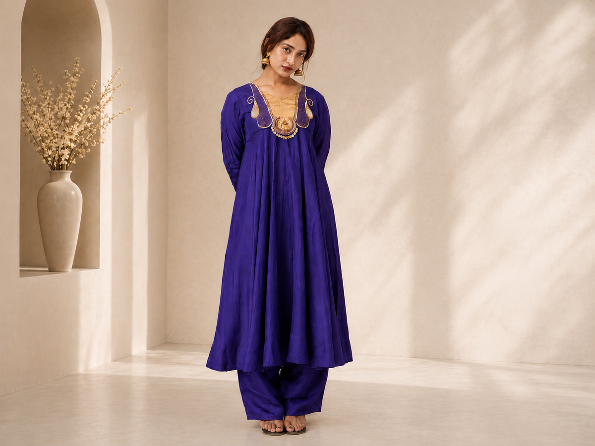 Royal purple Anarkali kurta set with gold embroidered neckline and matching pants